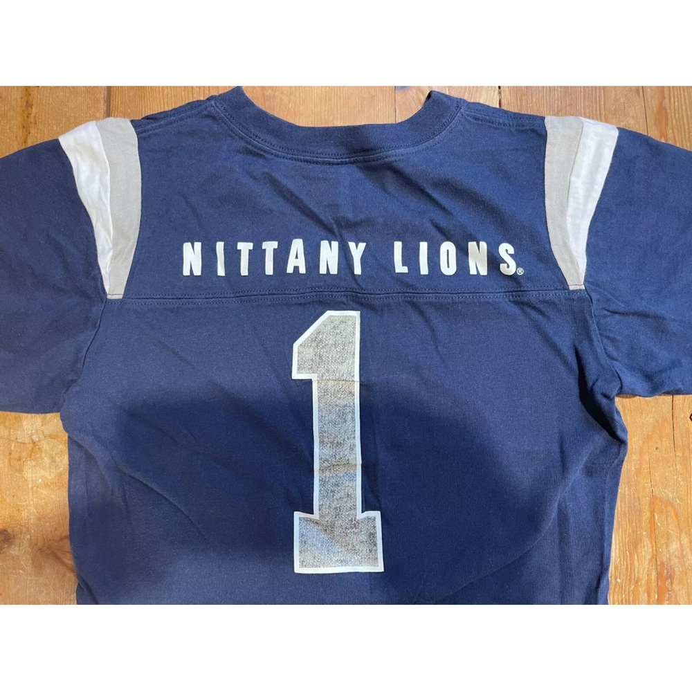 Penn State Nittany Lions Nike T-shirt. Blue jersey style with a V-neckline.